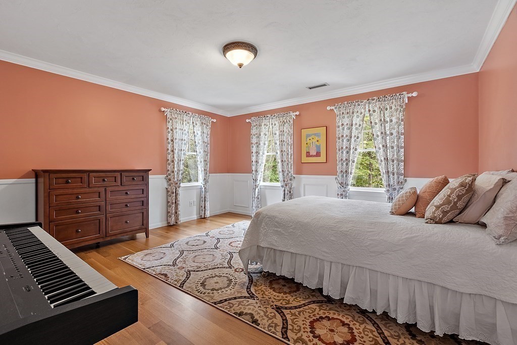 106 Fox Run Road Bolton, MA 01740 - Photo 29 of 41 a bedroom with a bed and a window