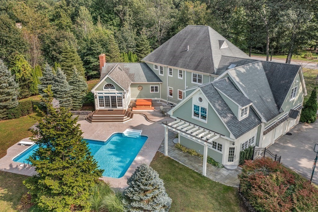 106 Fox Run Road Bolton, MA 01740 - Photo 3 of 41 a aerial view of a house with a big yard and large trees