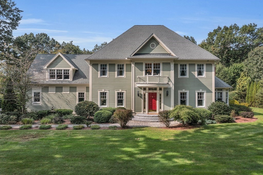 106 Fox Run Road Bolton, MA 01740 - Photo 39 of 41 a front view of a house with a yard