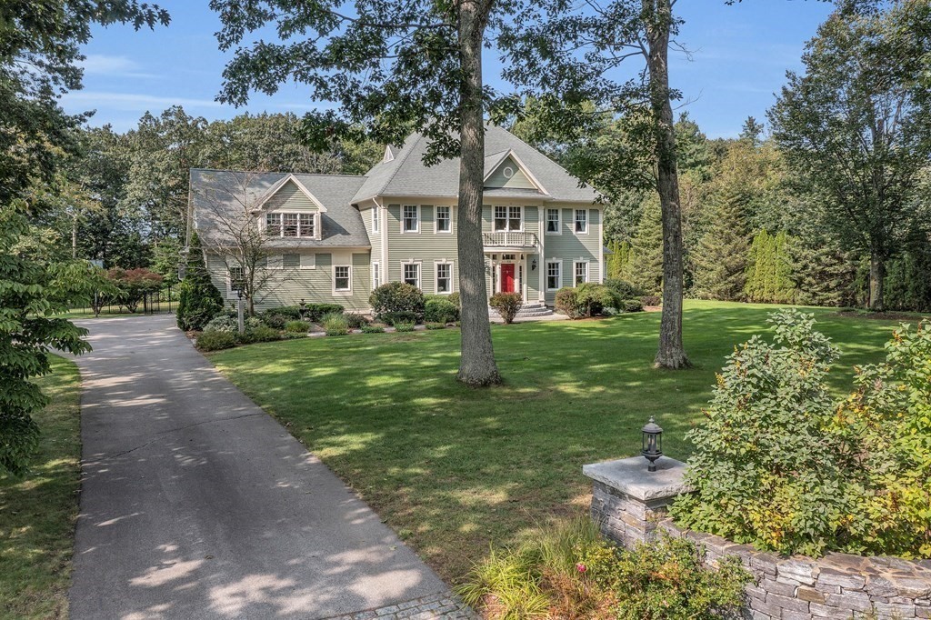 106 Fox Run Road Bolton, MA 01740 - Photo 40 of 41 a front view of a house with garden