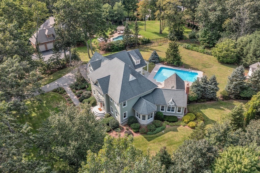 106 Fox Run Road Bolton, MA 01740 - Photo 41 of 41 an aerial view of a house with outdoor space and a lake view in back