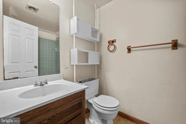 a bathroom with a sink and a toilet