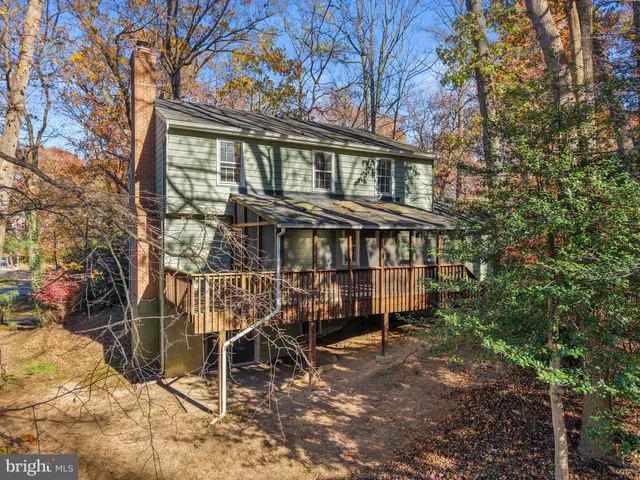 a view of a building with a large tree