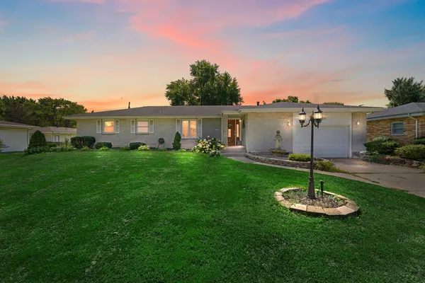 a house view with a garden space