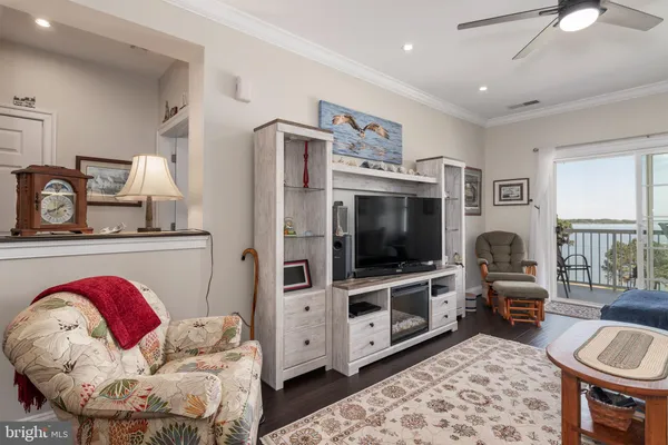 a bed room with a bed window and a dresser