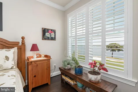 a view of a bathroom with a shower and a window