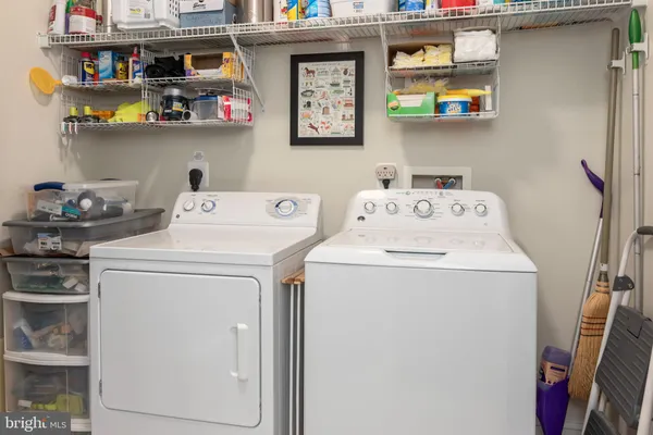 a view of a balcony with furniture