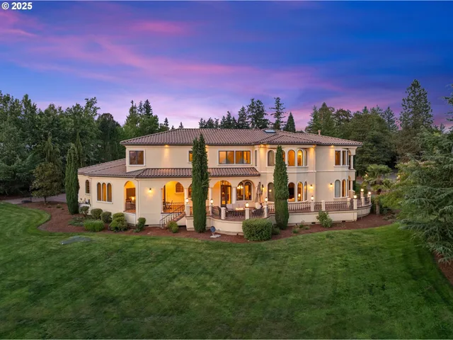 a view of a dining room with furniture and a floor to ceiling window