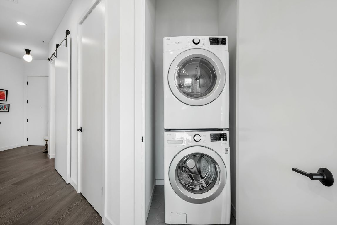 800 Embassy Drive, Unit 337 Austin, TX 78702 - Photo 17 of 29 a view of a hallway with washer and dryer