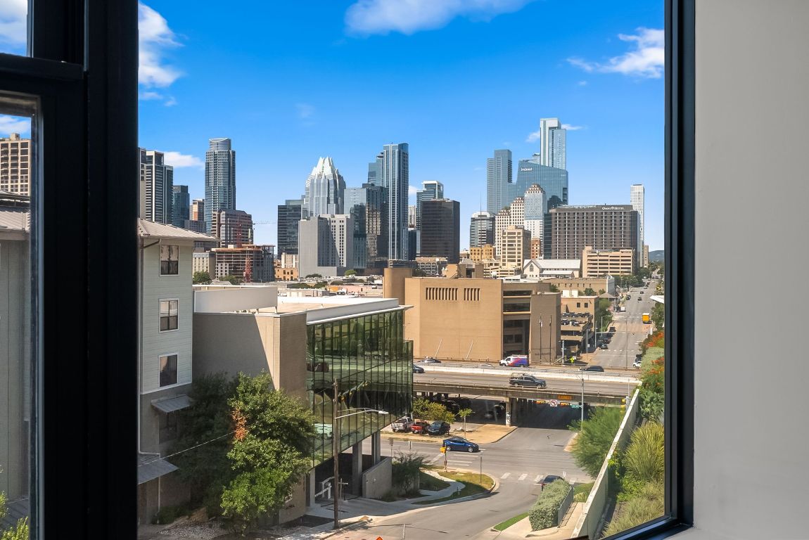 800 Embassy Drive, Unit 337 Austin, TX 78702 - Photo 8 of 29 a view of a city with tall buildings