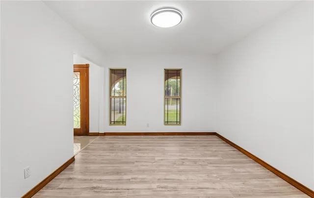 an empty room with windows