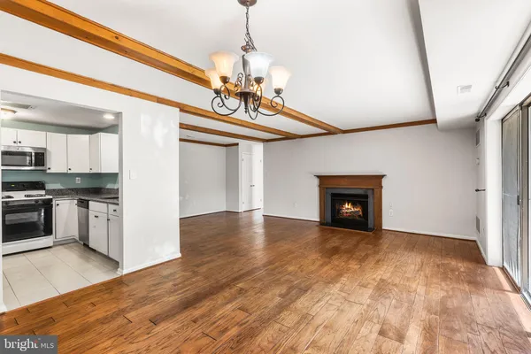 a view of a kitchen with a sink and dishwasher