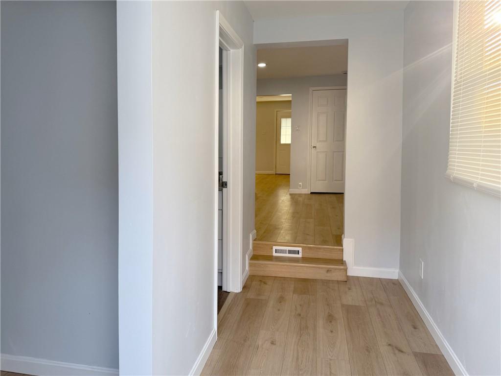 1252 Jefferson Street Vandergrift, PA 15690 - Photo 18 of 22 a view of a room with wooden floor