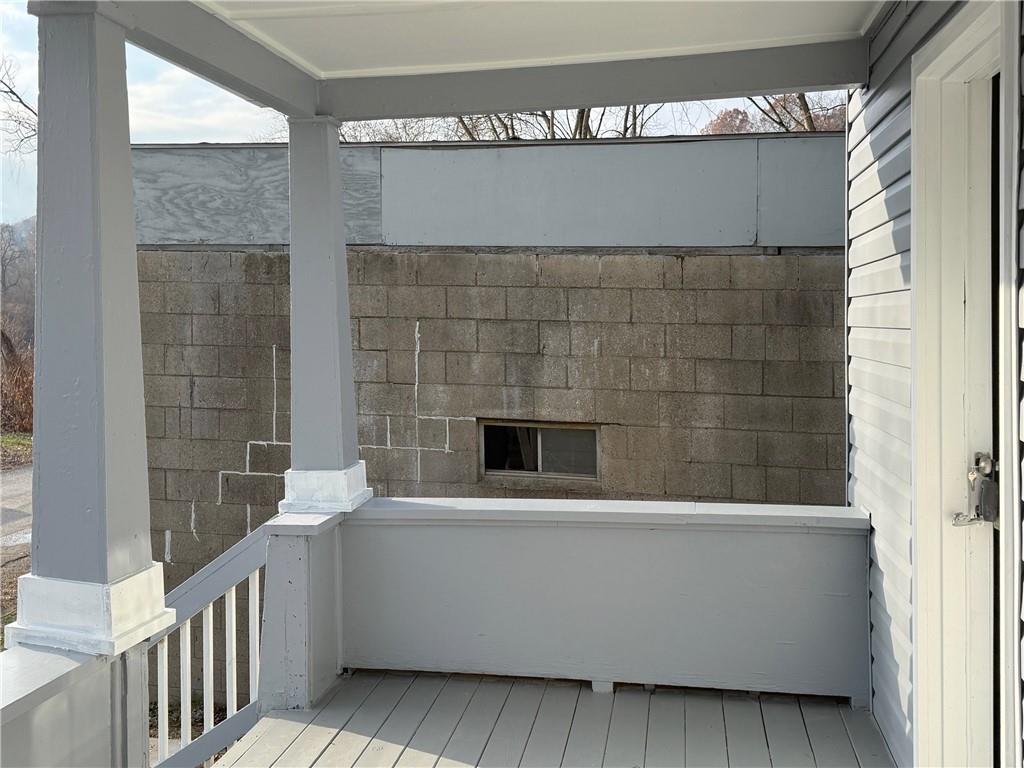 1252 Jefferson Street Vandergrift, PA 15690 - Photo 2 of 22 a living room with a couch and a fireplace