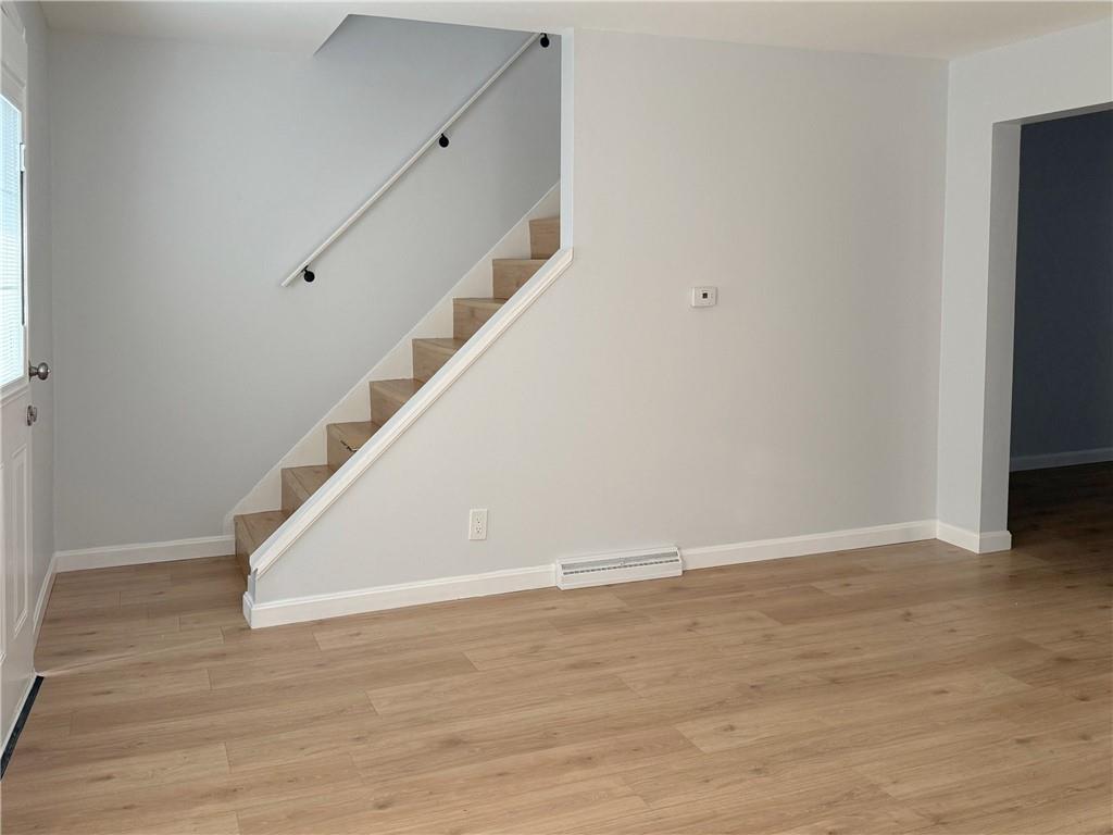 1252 Jefferson Street Vandergrift, PA 15690 - Photo 10 of 22 a view of entryway with wooden floor