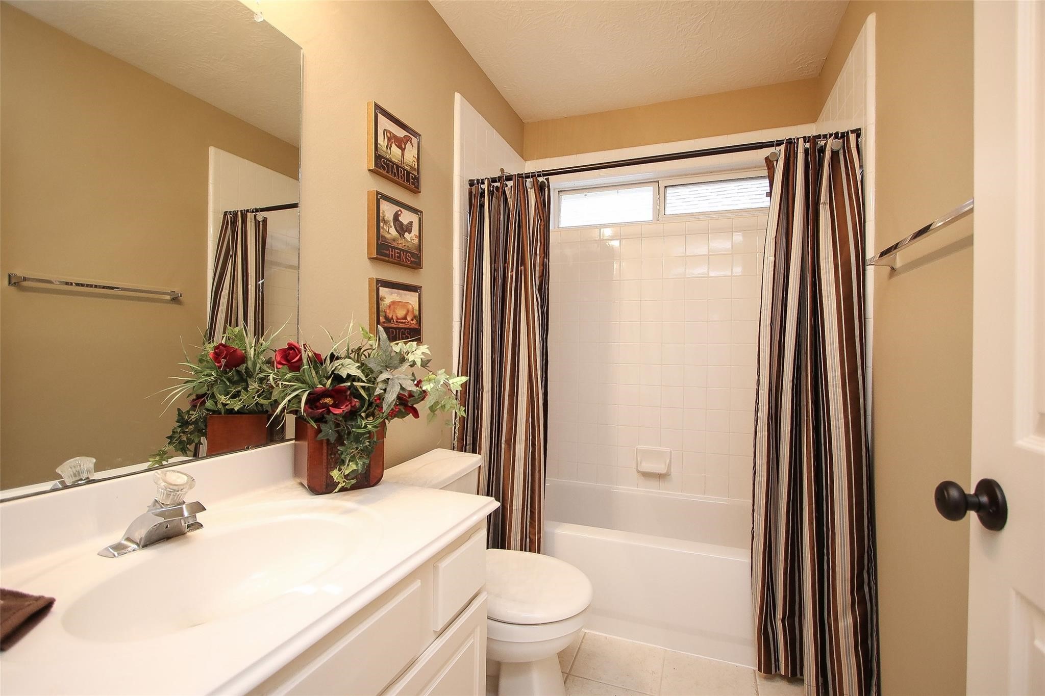 3415 Candlepine Drive Spring, TX 77388 - Photo 16 of 23 a bathroom with a sink toilet and shower