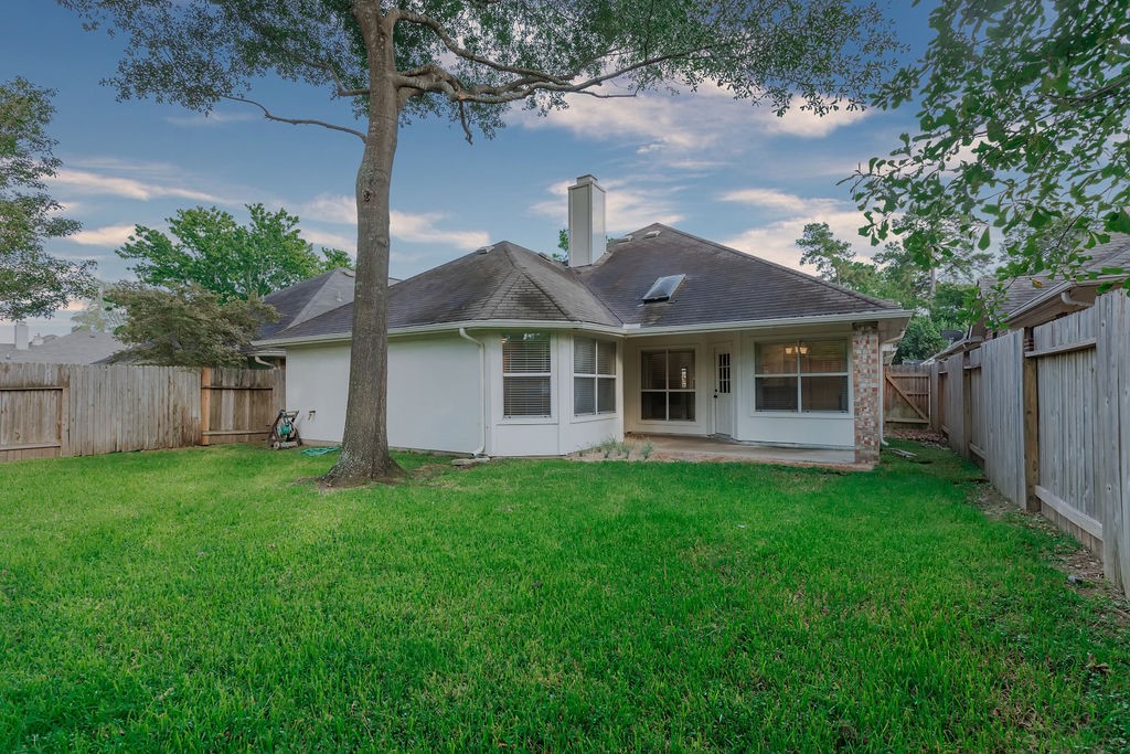 3415 Candlepine Drive Spring, TX 77388 - Photo 19 of 23 a view of a house with a backyard