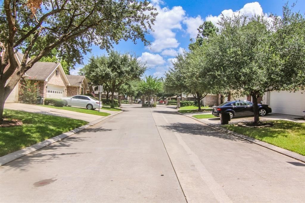 3415 Candlepine Drive Spring, TX 77388 - Photo 20 of 23 a view of a street with houses on both side of the road