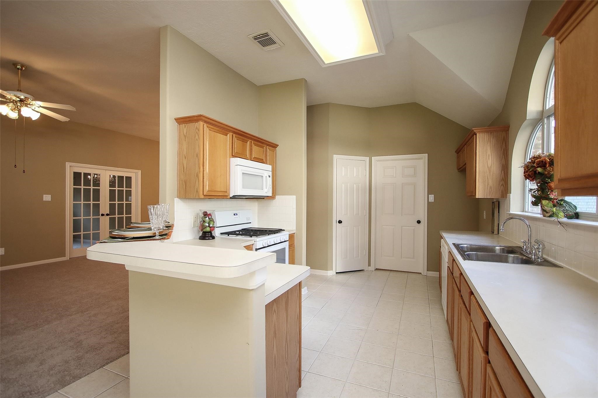 3415 Candlepine Drive Spring, TX 77388 - Photo 9 of 23 a view of a kitchen with a sink