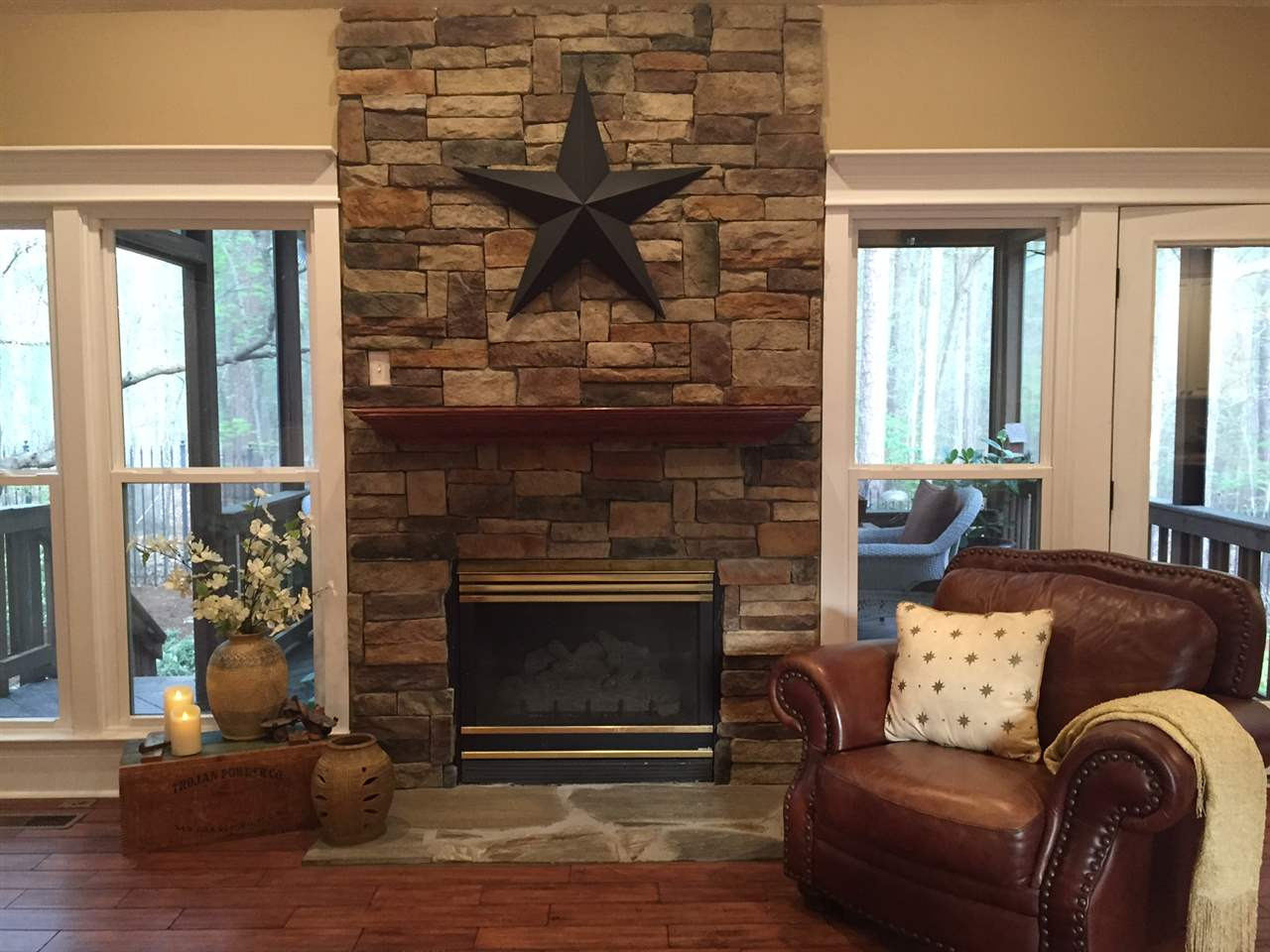 8536 Yucca Trail Raleigh, NC 27615 - Photo 3 of 23 What a place to curl up with a good book! This stone fireplace turns on with a simple switch. It is a one of a kind, floor to ceiling work of art! stone fireplace