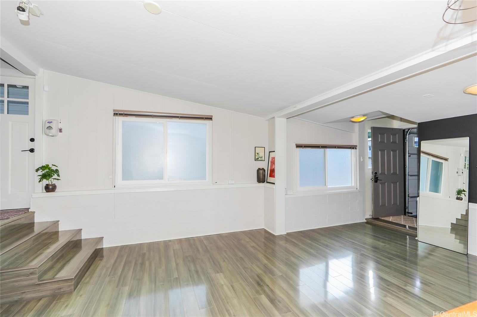 3305 East Manoa Road Honolulu, HI 96822 - Photo 11 of 25 a view of livingroom with furniture and wooden floor