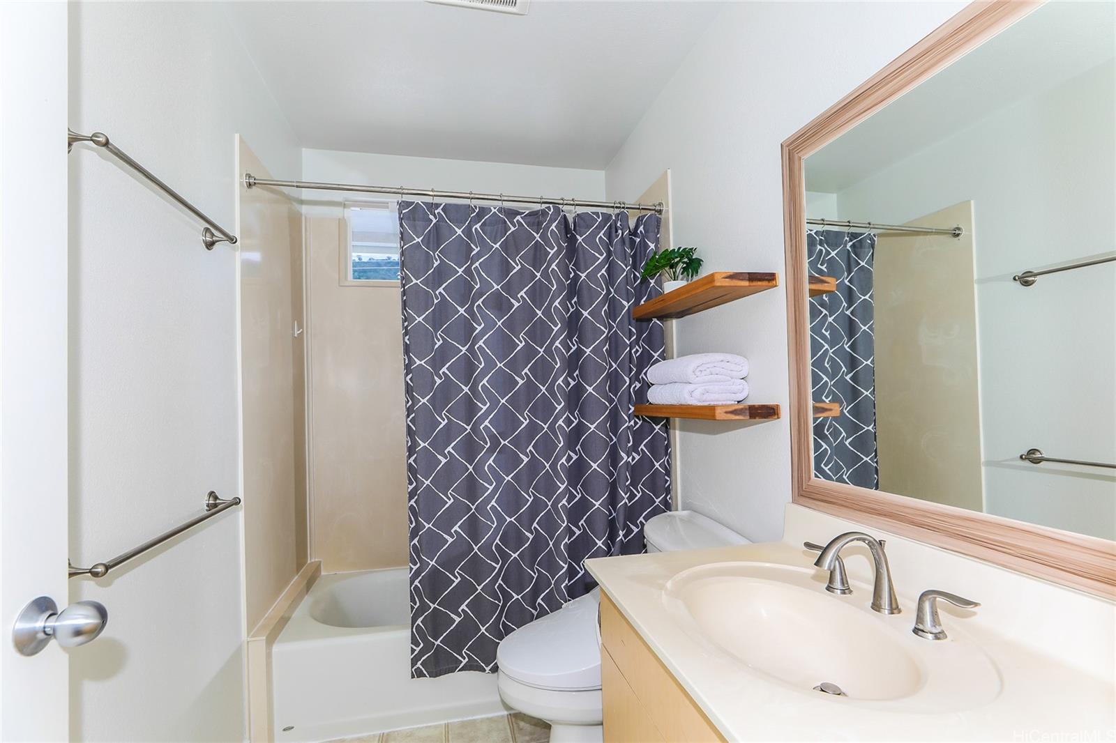3305 East Manoa Road Honolulu, HI 96822 - Photo 16 of 25 a bathroom with a sink toilet and shower