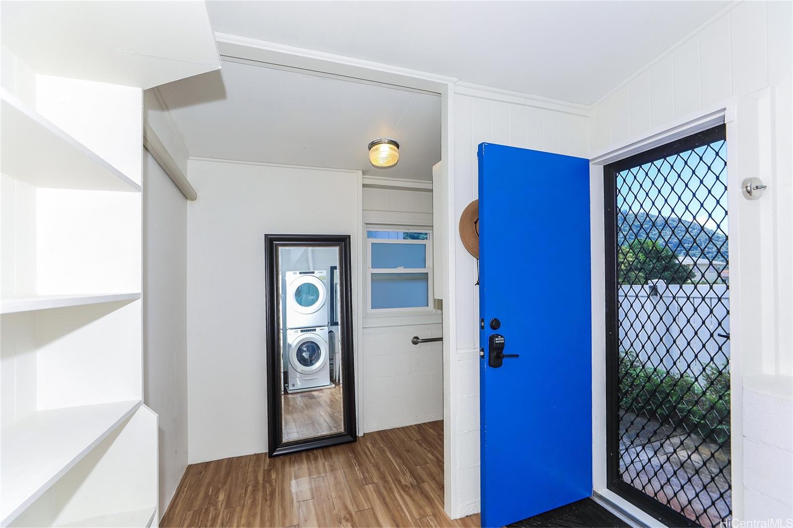 3305 East Manoa Road Honolulu, HI 96822 - Photo 17 of 25 a view of an entryway door with wooden floor