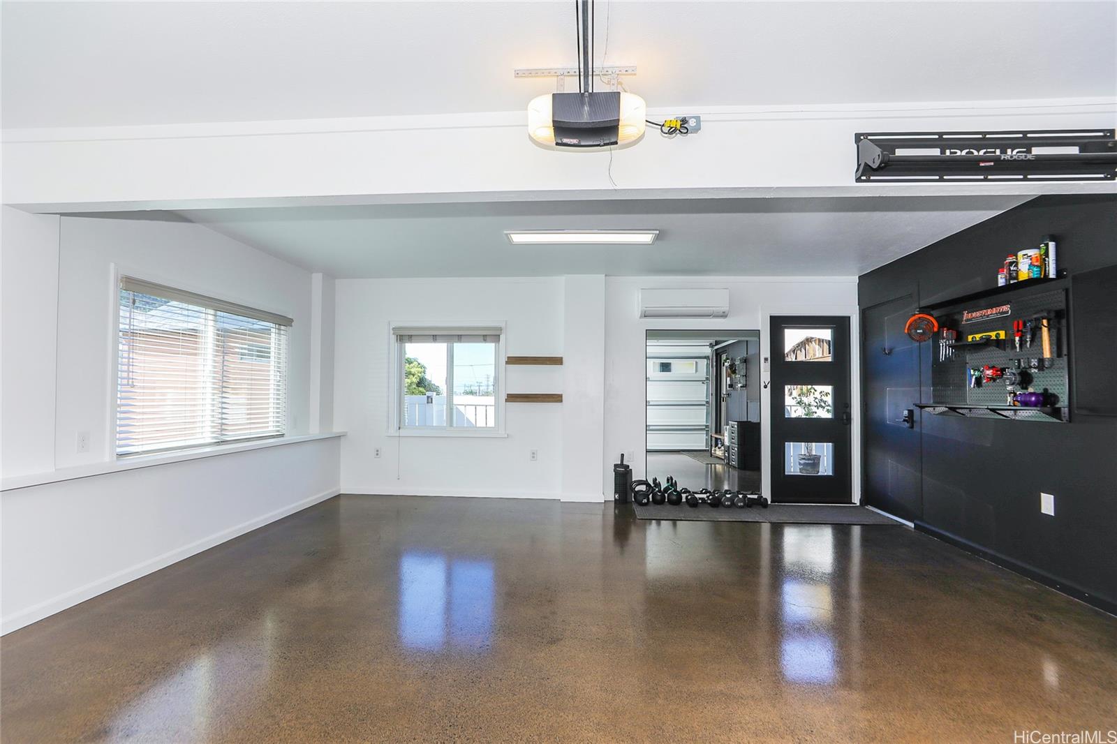 3305 East Manoa Road Honolulu, HI 96822 - Photo 19 of 25 wooden floor in an empty room with a window