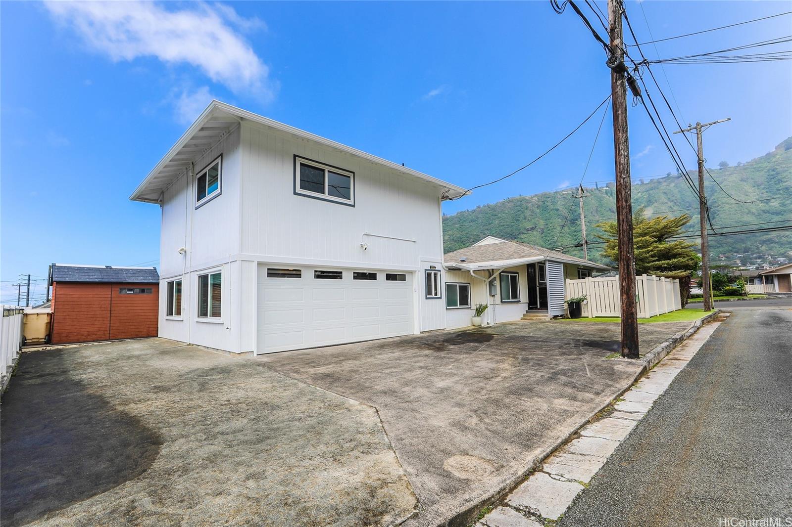 3305 East Manoa Road Honolulu, HI 96822 - Photo 2 of 25 a view of a house with a yard
