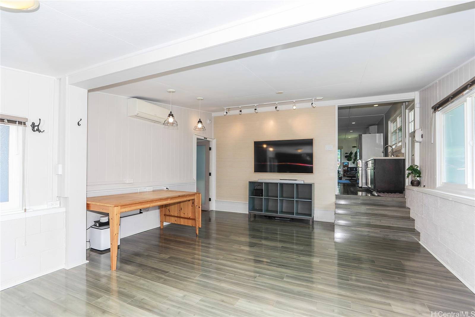 3305 East Manoa Road Honolulu, HI 96822 - Photo 10 of 25 a living room with furniture and a wooden floor