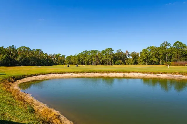 a view of a lake with outdoor space