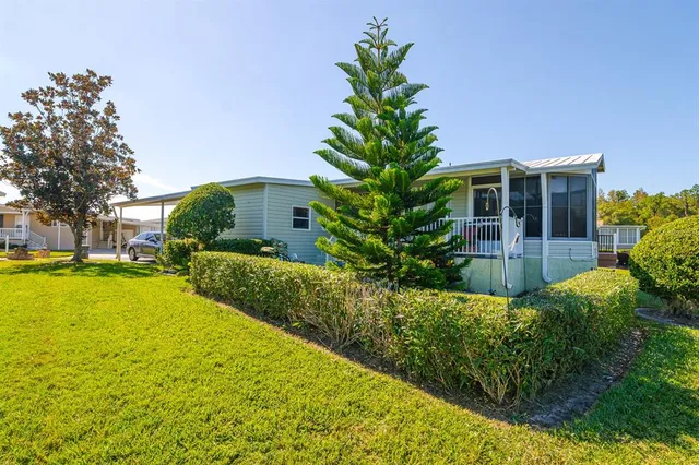a view of house with swimming pool