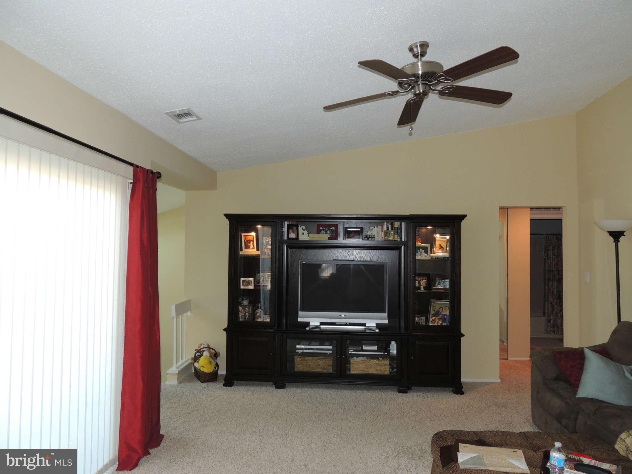 11033 Villaridge Court, Unit B Reston, VA 20191 - Photo 4 of 25 a view of livingroom with furniture and windows