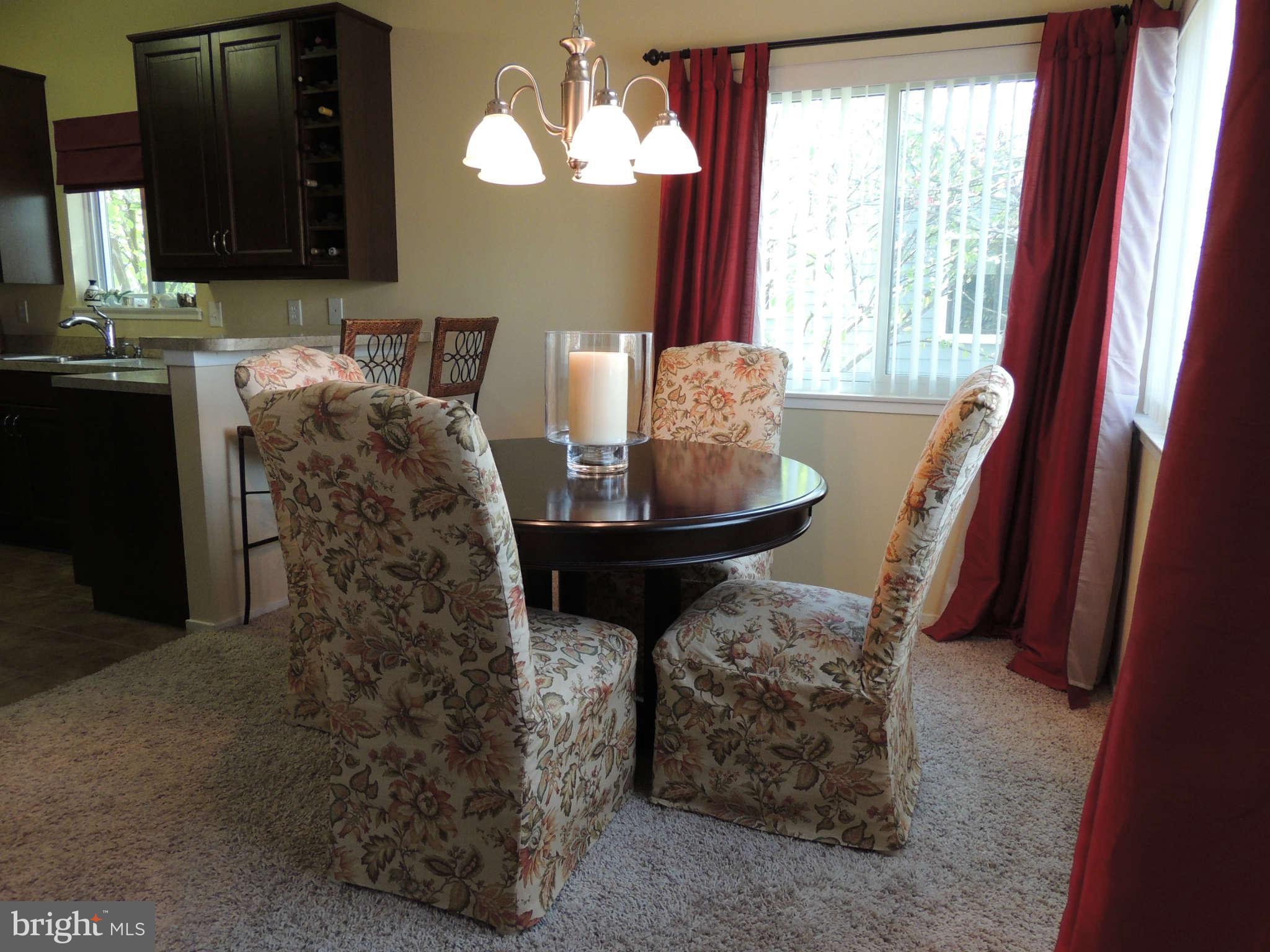 11033 Villaridge Court, Unit B Reston, VA 20191 - Photo 6 of 25 a living room with furniture and a fireplace