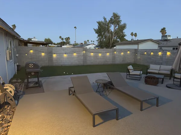 a view of a terrace with seating area