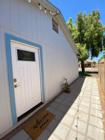 a view of a backyard of the house