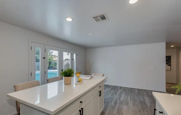 a view of kitchen island with wooden floor and outdoor space