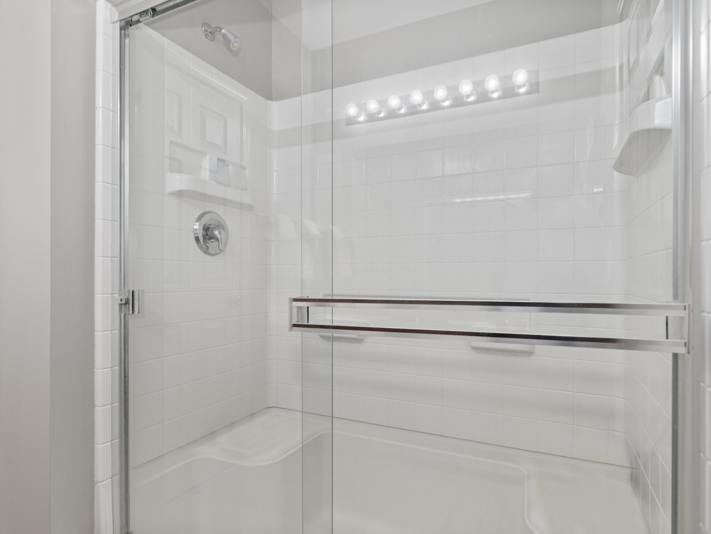 880 June Terrace, Unit 270 Lake Zurich, IL 60047 - Photo 16 of 26 a bathroom with a shower