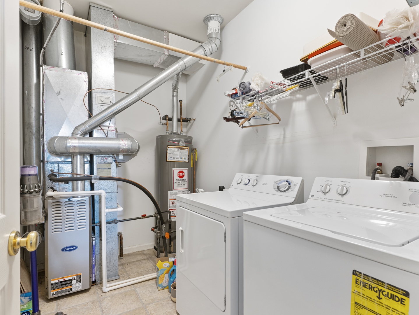 880 June Terrace, Unit 270 Lake Zurich, IL 60047 - Photo 19 of 26 a utility room with dryer and washer
