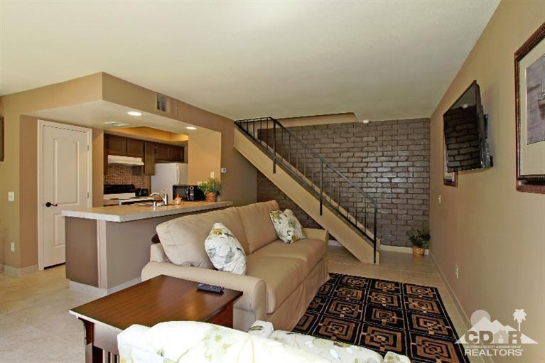 72664 Eagle Road, Unit 3 Palm Desert, CA 92260 - Photo 7 of 16 a living room with furniture