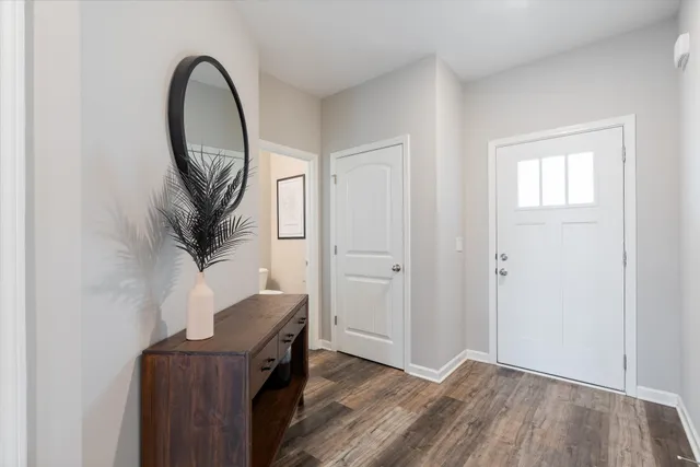 a view of livingroom with furniture and wooden floor