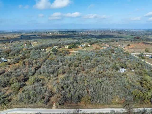 a view of a city with ocean view