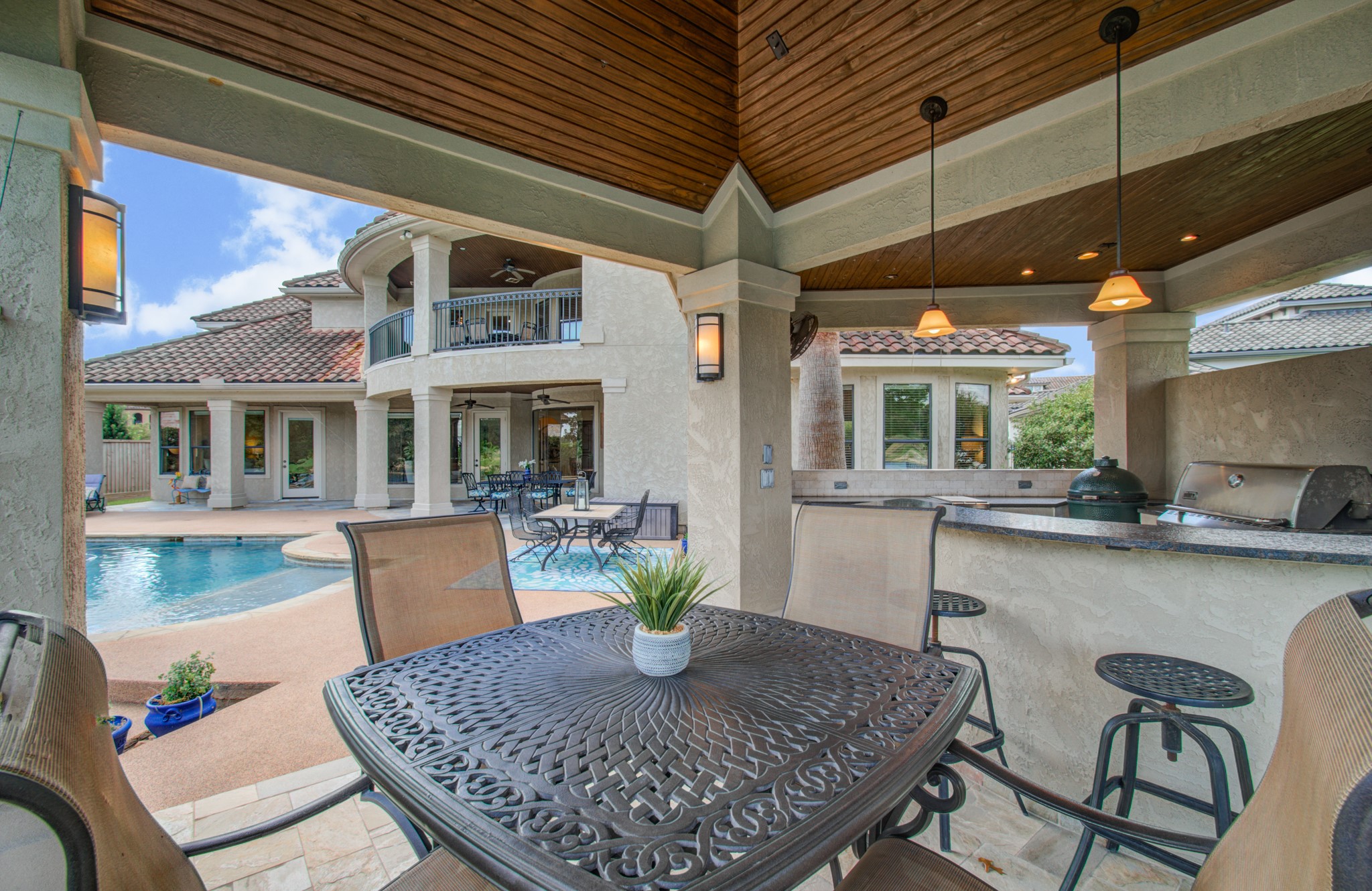 26 Post Shadow Estate Drive Spring, TX 77389 - Photo 45 of 49 View of the house and backyard from the outdoor kitchen's dining area