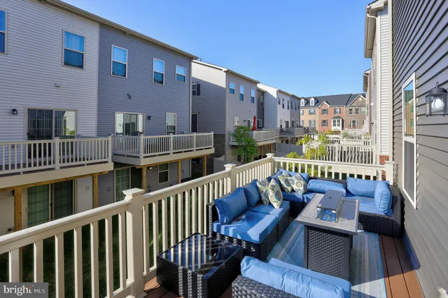 a view of balcony with furniture