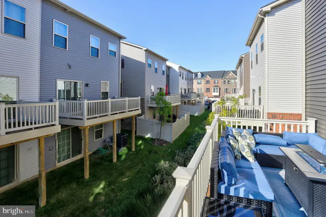 a view of balcony with furniture and garden