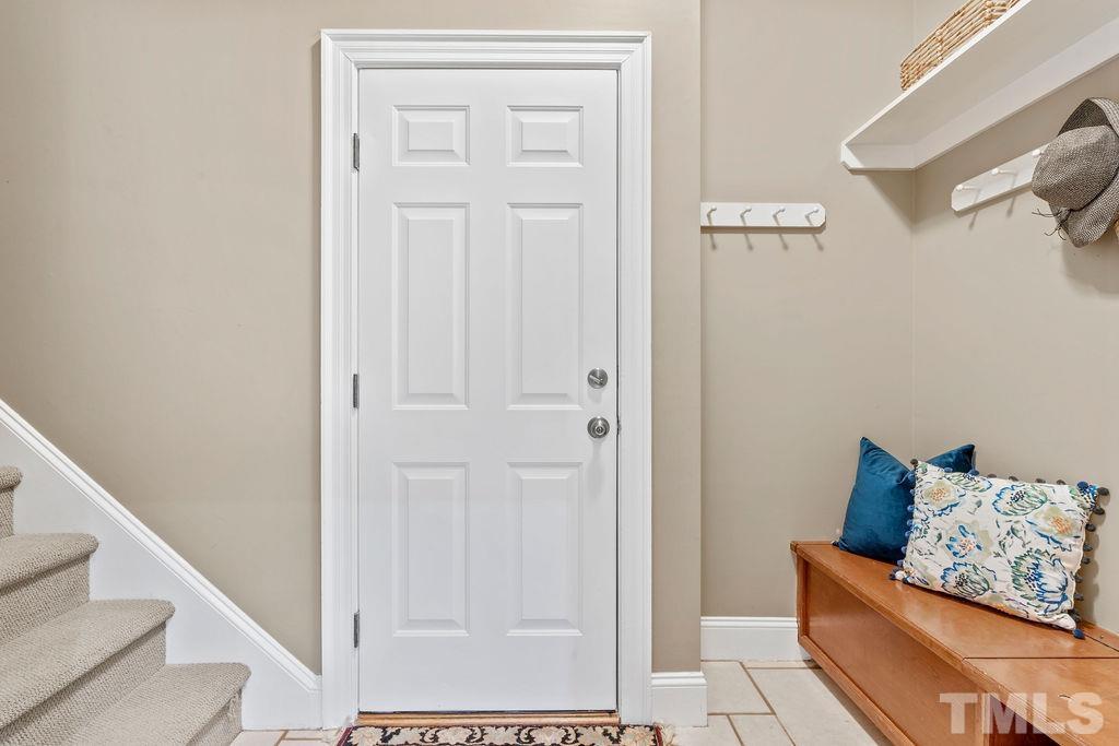 5844 Applegarth Lane Raleigh, NC 27614 - Photo 45 of 70 a view of room with furniture and wooden floor