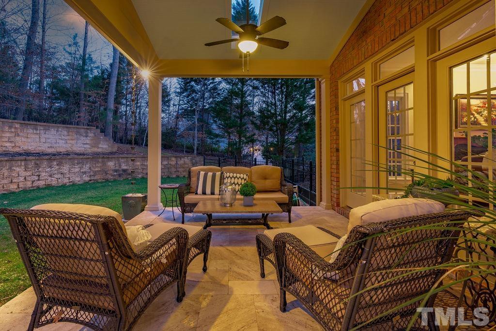 5844 Applegarth Lane Raleigh, NC 27614 - Photo 66 of 70 a outdoor living space with patio furniture and a garden