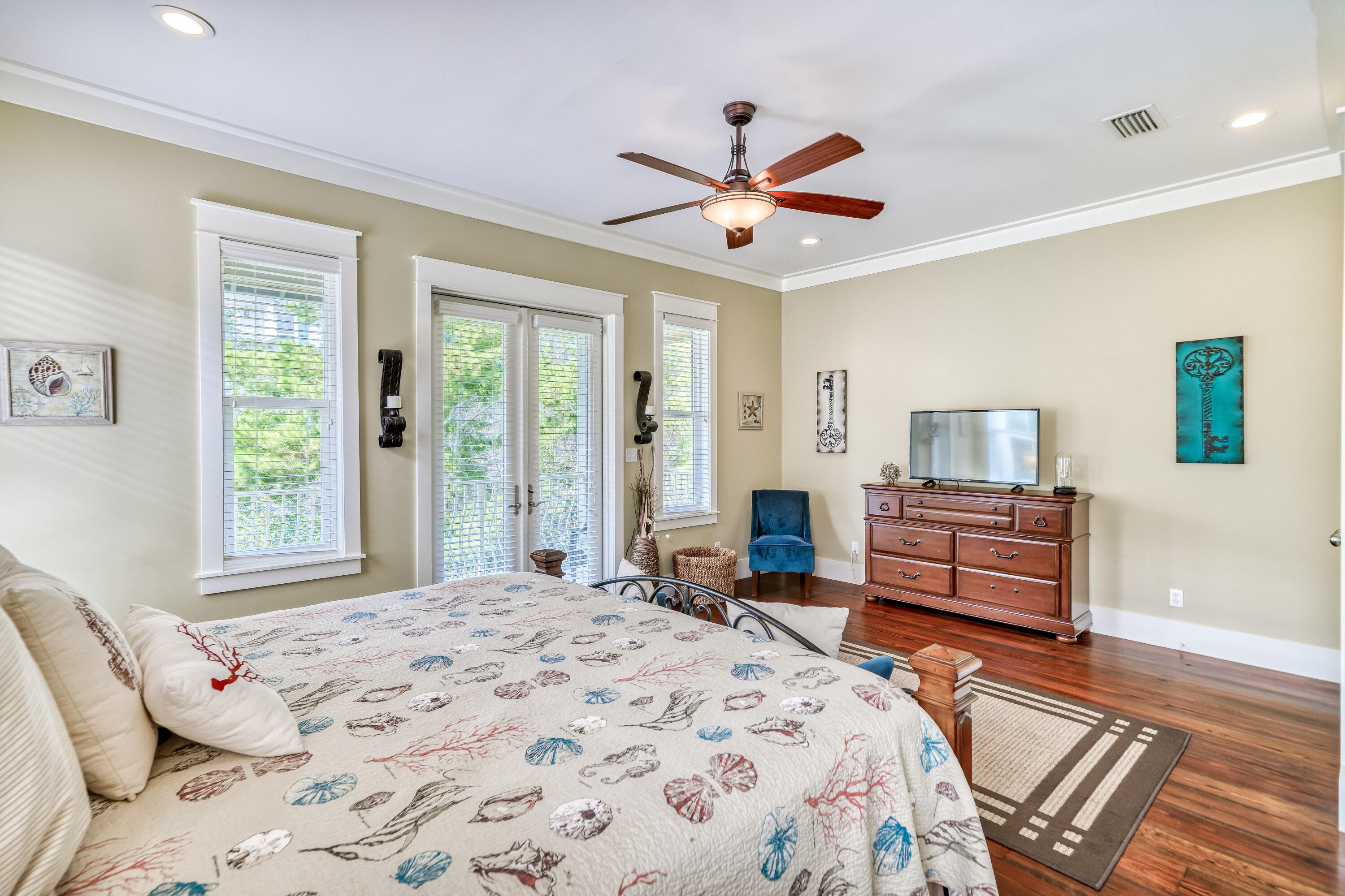 48 Cast Net Lane Inlet Beach, FL 32461 - Photo 35 of 61 a bedroom with a bed and wooden floor