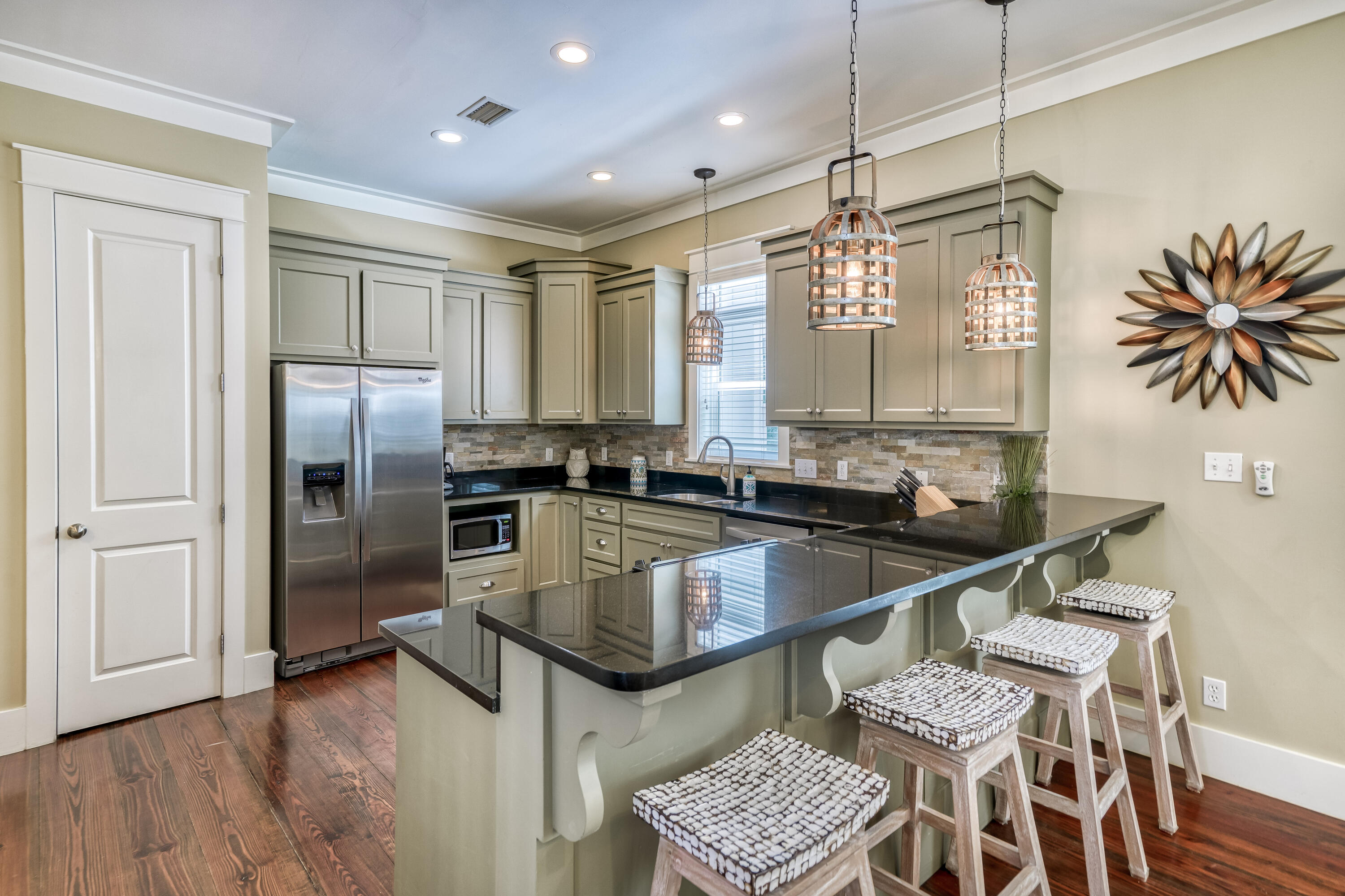 48 Cast Net Lane Inlet Beach, FL 32461 - Photo 5 of 61 a kitchen with granite countertop a sink appliances and cabinets