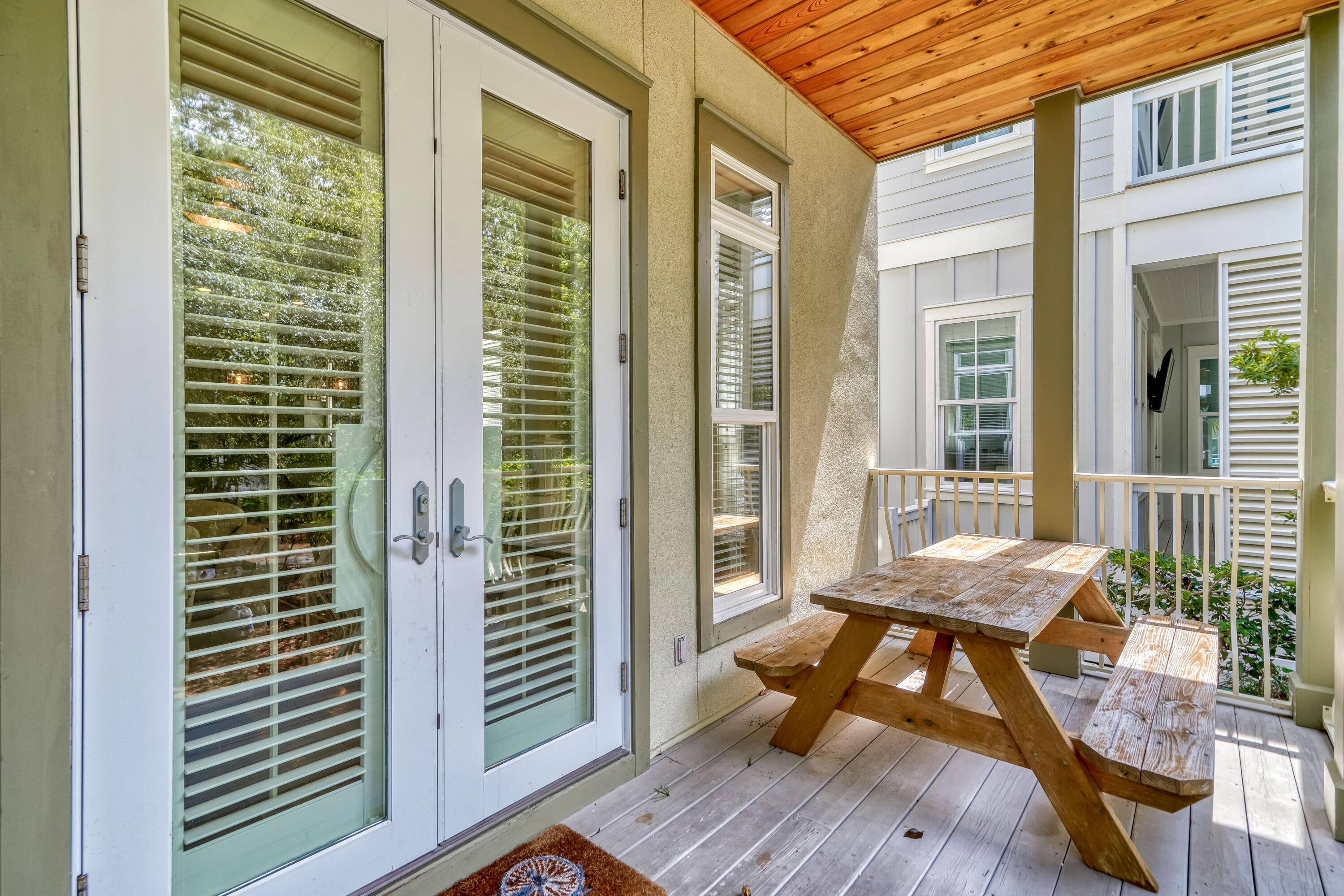 48 Cast Net Lane Inlet Beach, FL 32461 - Photo 59 of 61 a view of a balcony with chairs and wooden floor